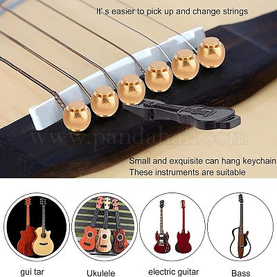 Acoustic guitar string pins top