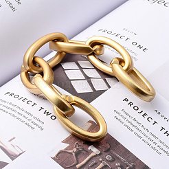手作りの不透明なスプレー塗装アクリルアズキチェーン  ジュエリー作りのための  オーバル  ゴールド  リンク：35x19x6mm  39.37インチ（1m）/連&nbsp;AJEW-JB00752-01