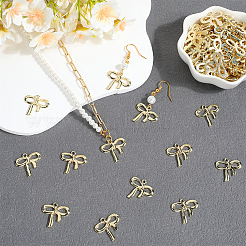 ラックメッキ合金ペンダント100個  蝶結び  ゴールドカラー  18x20x1mm  穴：1.6mm&nbsp;FIND-SC0012-66