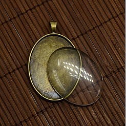 40x30mm透明オーバルガラスカボションカバーとアンティークブロンズ合金製カボションセッティング付きブランクペンダントDIYポートレートペンダント作り  鉛フリーとニッケルフリー  ペンダント：50x32.5mm  穴：7mm  トレイ：40x30mm&nbsp;DIY-X0159-AB-FF