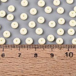 オペークガラスシードビーズ  丸い穴  ロンデル  レモンシフォン  4~4.5x2~3mm  穴：0.9~1mm  約6430個/ポンド&nbsp;SEED-N012-09A-02