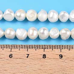 天然養殖淡水パールビーズ連売り  研磨両側  乳白色  6~7.5x7~8x5~6.5mm  穴：0.6mm  約52~53個/連  13.78~14.2''（35~35.5センチメートル）&nbsp;PEAR-N014-06C