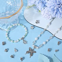 100スタイルのチベットスタイルの合金チューブベイル10個。  ループベイル  花とハートと葉っぱと蝶と柱  アンティークシルバー  7.5~14x5.5~9x4.5~9mm  穴：1.4~3mm  10個/スタイル&nbsp;FIND-SC0008-44