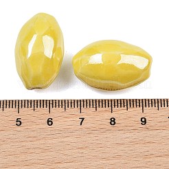 手作りの陶器ビーズ  ネックレスの装飾や手作りのDIY素材として  米の形状  きいろ  24x16mm  穴：3mm&nbsp;PW-WG559A4-01