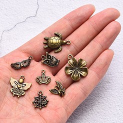 合金のチベット風チャーム  百の形  アンティークブロンズ  9~26x5~17x1~6mm  穴：1~2.5mm  約100個/袋&nbsp;TIBEP-YW0001-07AB