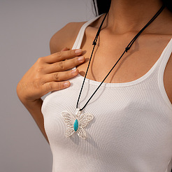 Alloy with Synthetic Turquoise Hollow Butterfly Pendant Black Waxed Cord Long Necklaces for Women&nbsp;FS-WG6109F-02