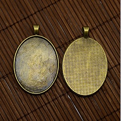 40x30mm Clear Oval Glass Cabochon Cover and Antique Bronze Alloy Blank Pendant Cabochon Settings for DIY Portrait Pendant Making&nbsp;DIY-X0159-AB-FF